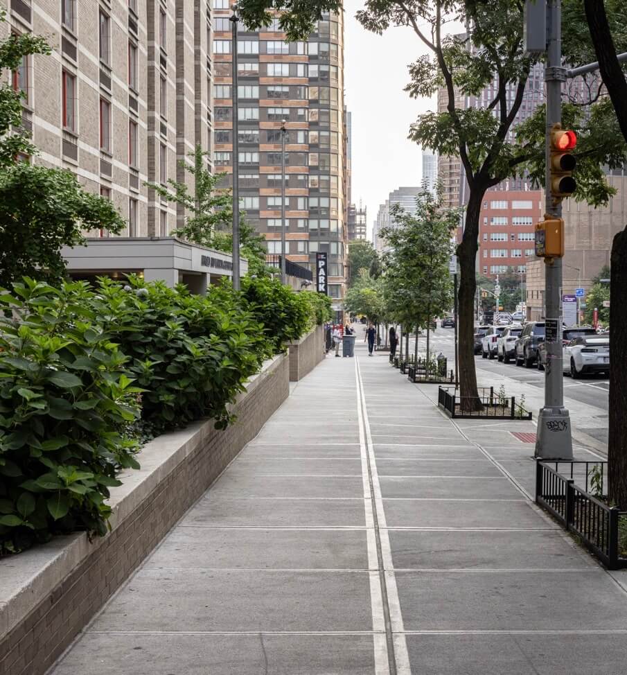 ADA-compliant pedestrian ramp installation at 545 First Avenue by Malatesta Paladino, sidewalk contractors in NYC.