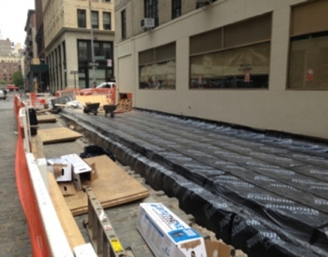 Traffic-bearing membrane repair in NYC for a parking garage by Malatesta Paladino, ensuring Local Law 126 compliance